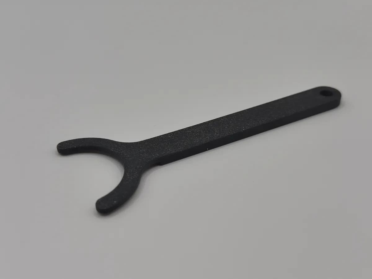 Cale de réglage en action sur une Citroën 2CV